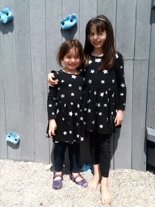 Lila and Ava at the town beach 